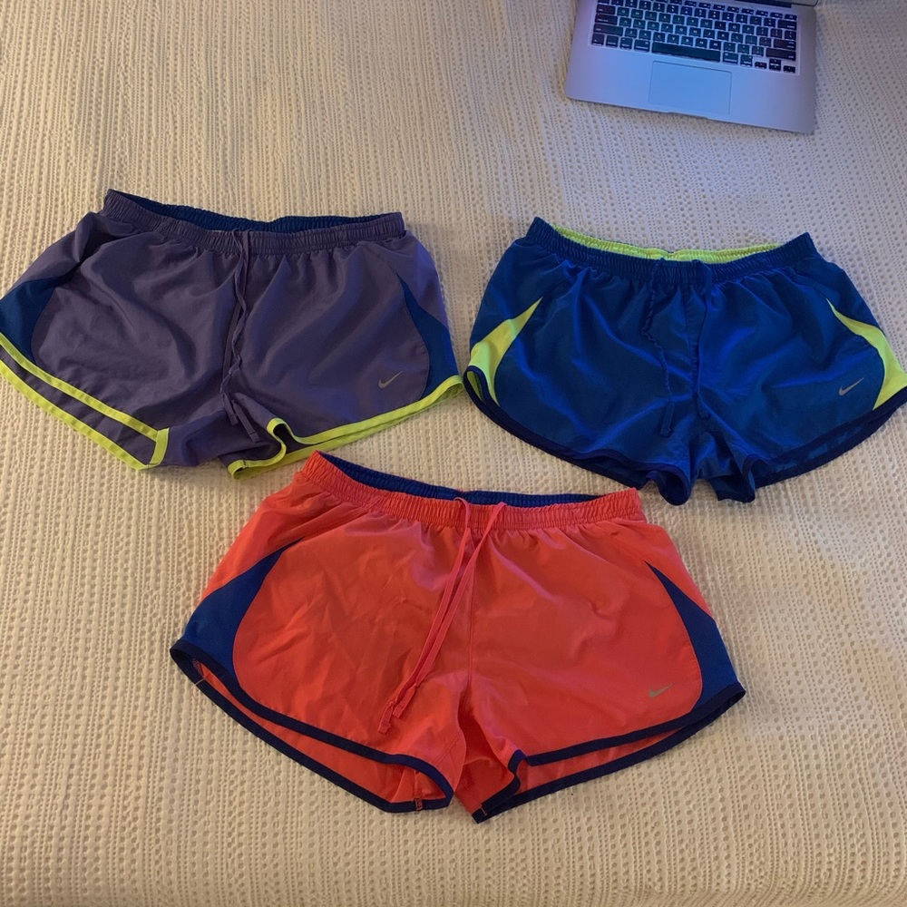 3 colorful Nike shorts